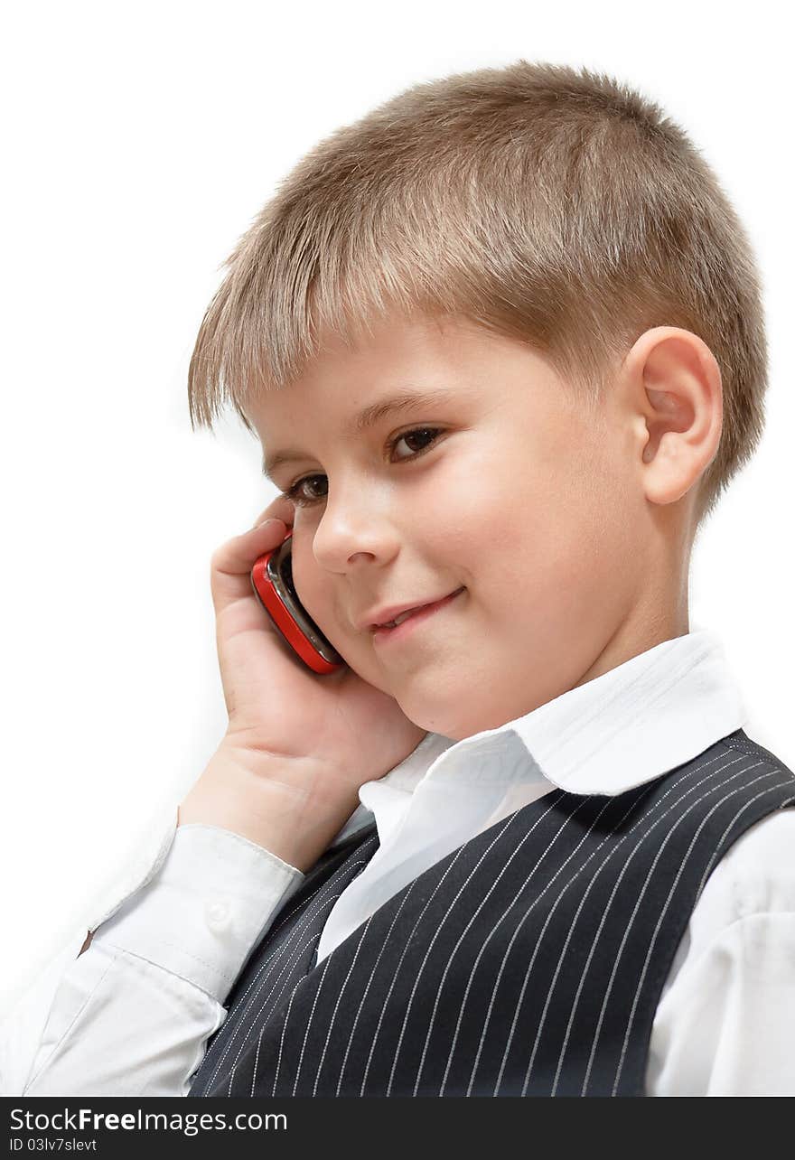 A boy with a cell phone. Isolated on white background