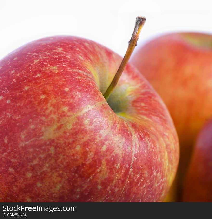 Red apples isolated on a white background.