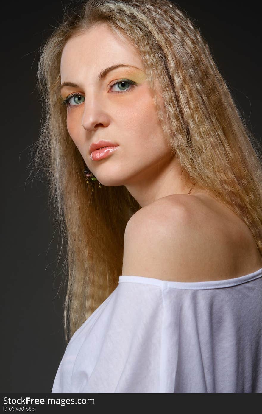 Portrait of young beautiful woman with long hair