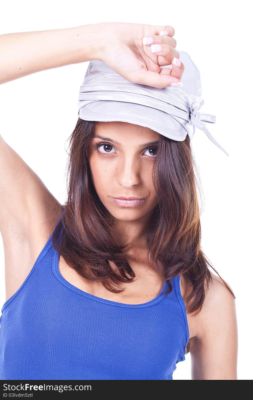 Beautiful woman wearing a silver hat and posing. Beautiful woman wearing a silver hat and posing