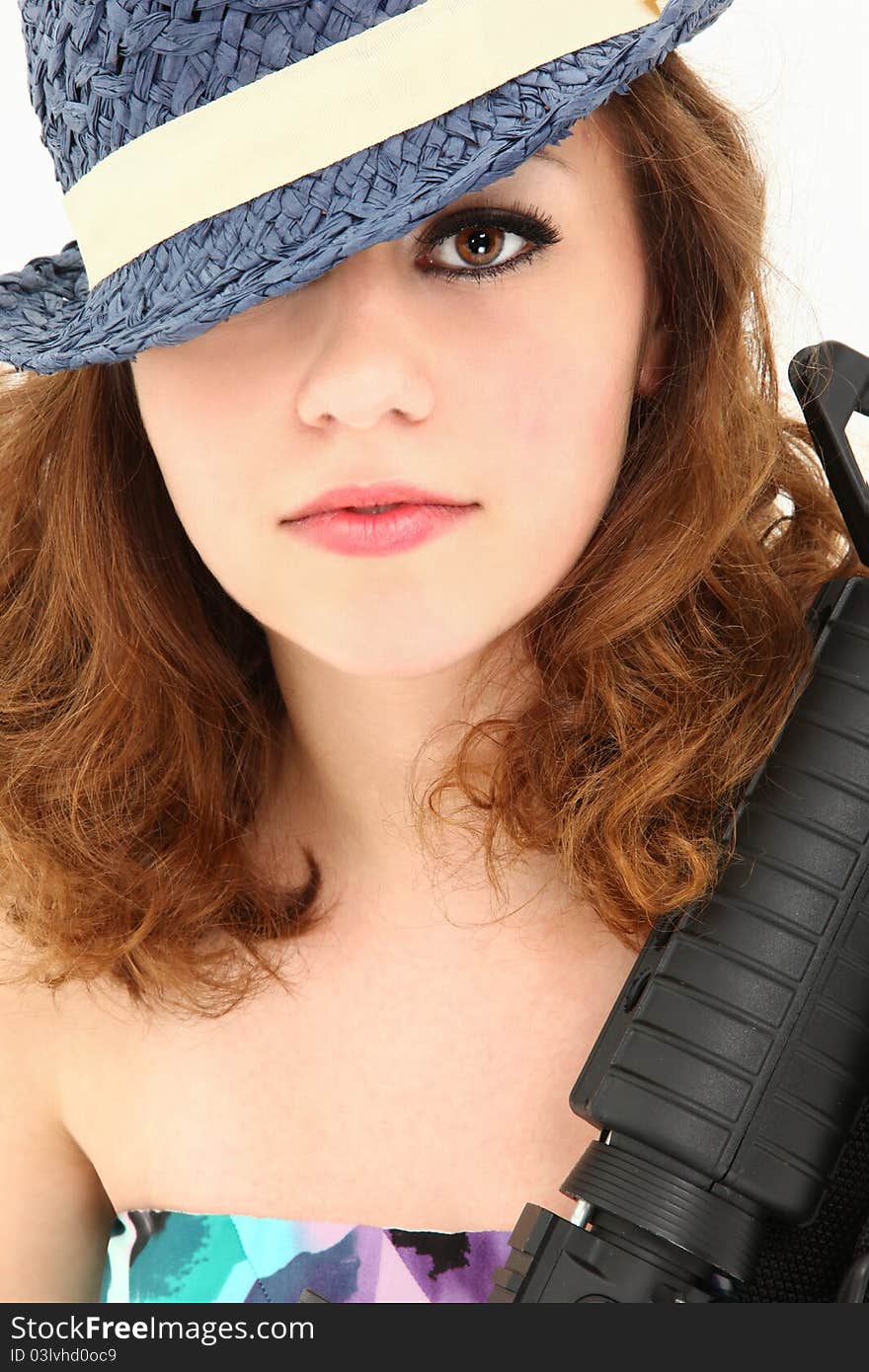 Close up portrait teen in mafia girl costume with riffle over white background. Close up portrait teen in mafia girl costume with riffle over white background.