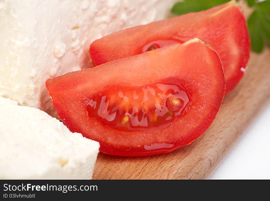Close up of arranged sliced tomatoes and White Bulgarian feta cheese