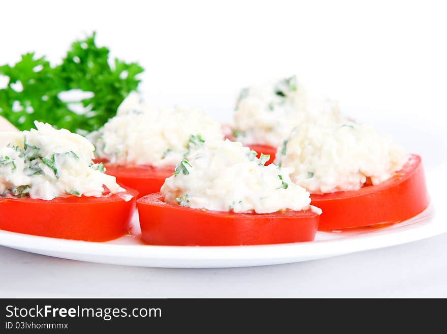 Sliced tomato with cheese sauce