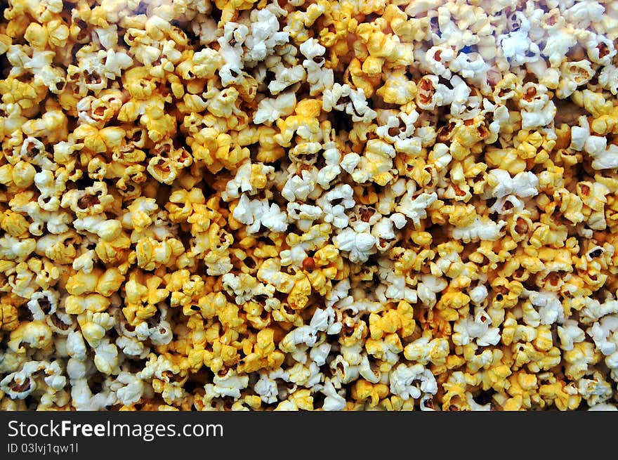 An image of popcorn behind glass