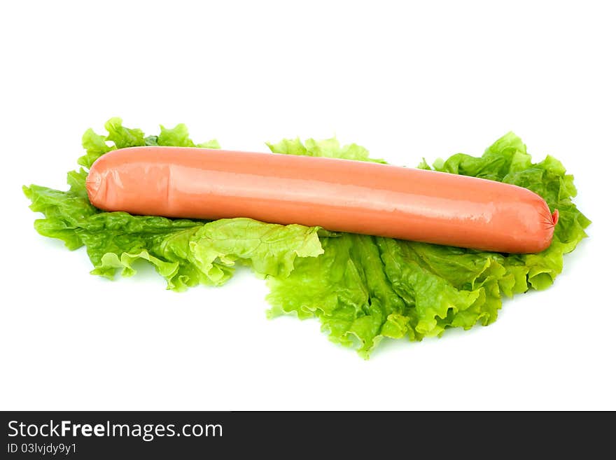 Sausage arranged with lettuce isolated