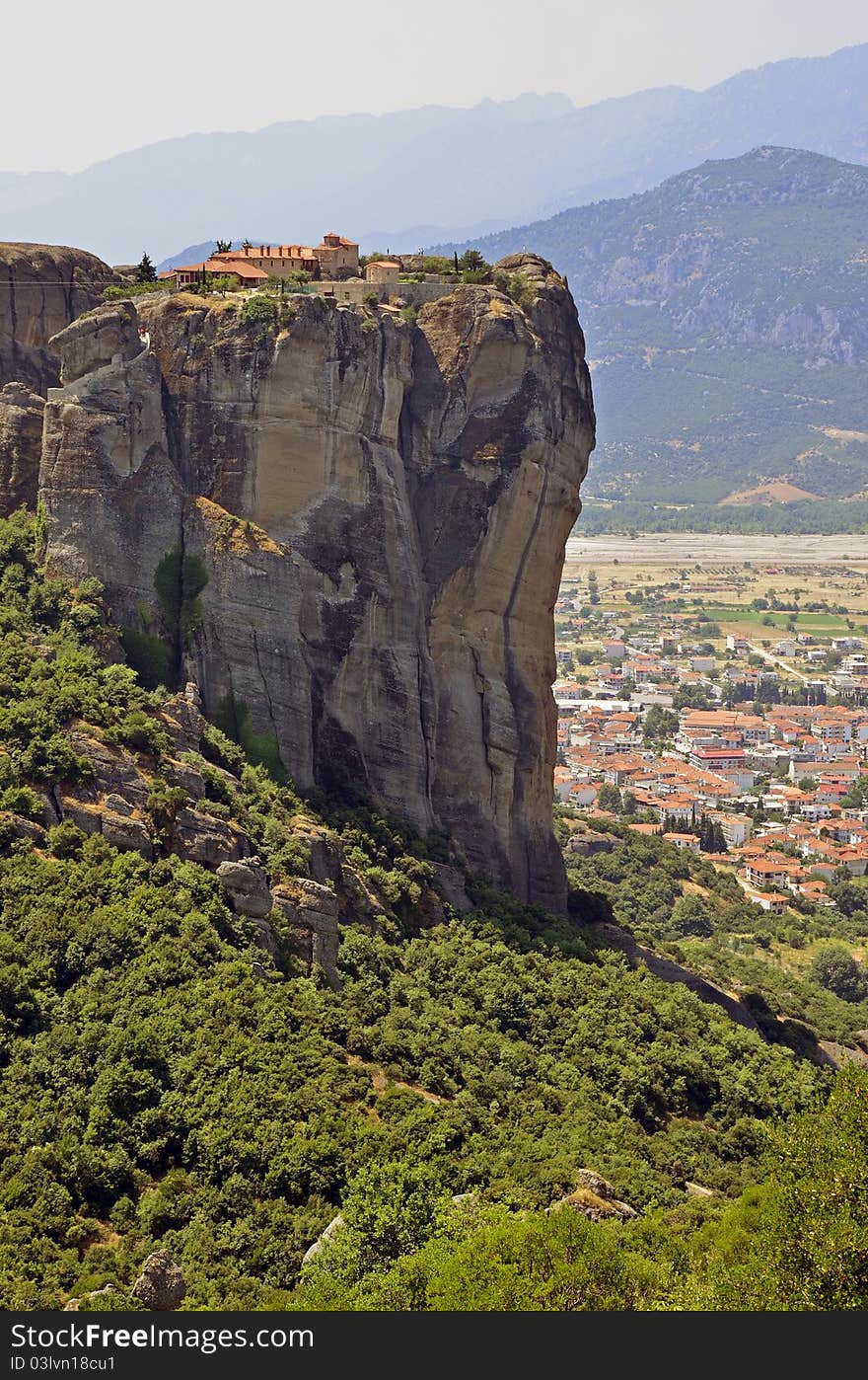 High church on Meteora mountain peak and Kalambaka city. High church on Meteora mountain peak and Kalambaka city