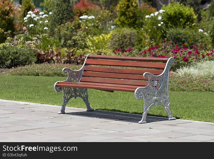 Bench And Flower In Park