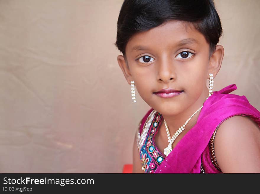 Indian Little Girl Posing To Camera