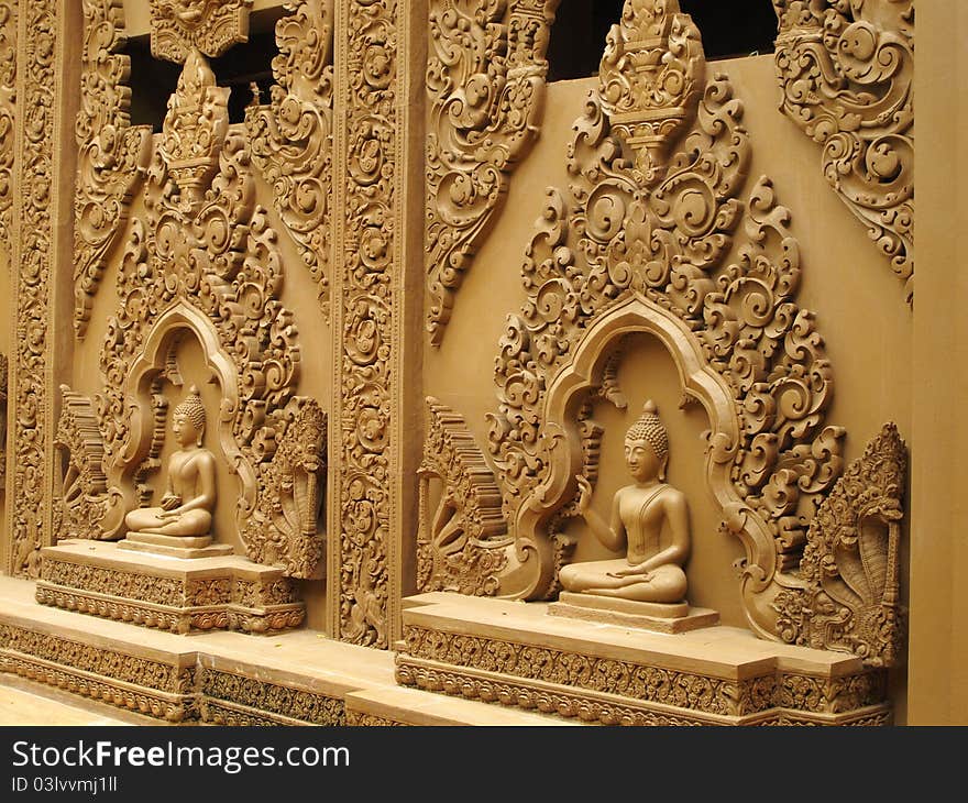 Buddha statues on the wall