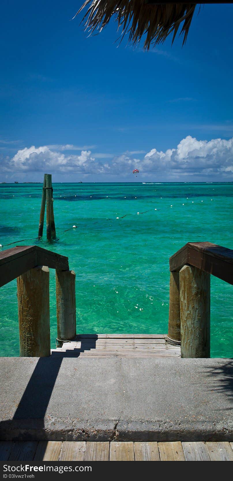 Stairway leading down to a caribbean lagoon. Stairway leading down to a caribbean lagoon