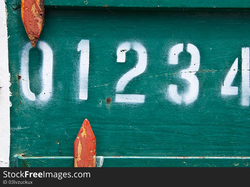 Close up scoreboard with white digits.