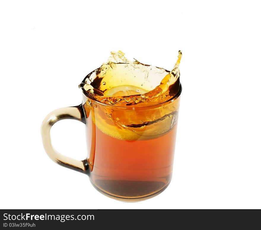 Tea with lemon on a white background