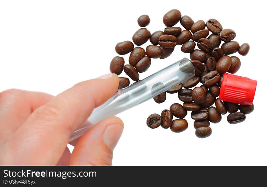 Isolated photo depicting emptying the coffee beans out of the tube;. Isolated photo depicting emptying the coffee beans out of the tube;