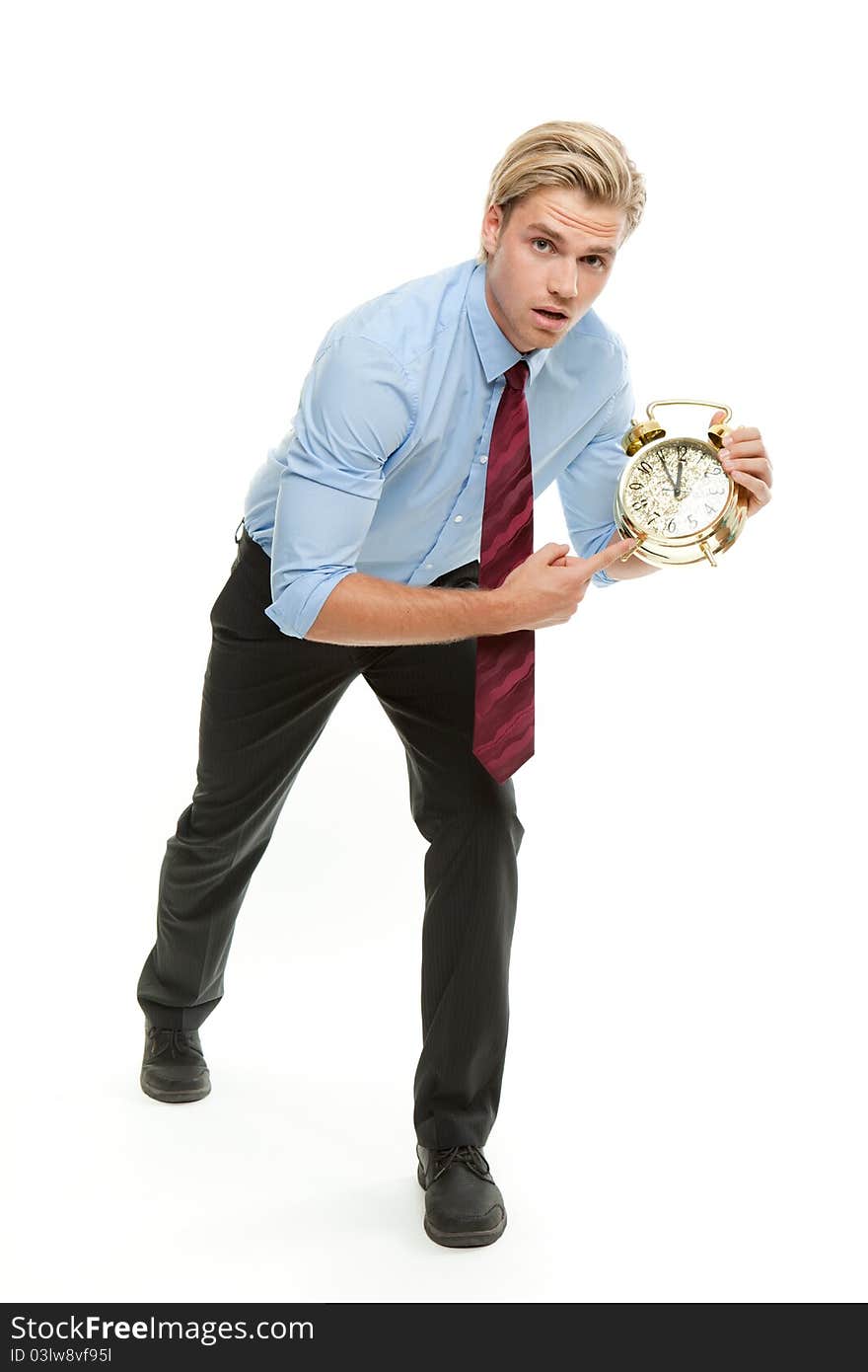 Businessman showing a clock in his hand. Businessman showing a clock in his hand