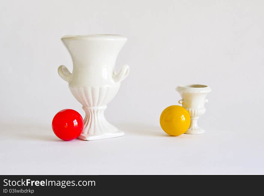 Still-life with balls and two vases