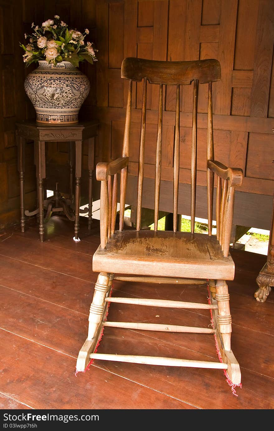 Rocking wood chair in thai house ,thailand. Rocking wood chair in thai house ,thailand