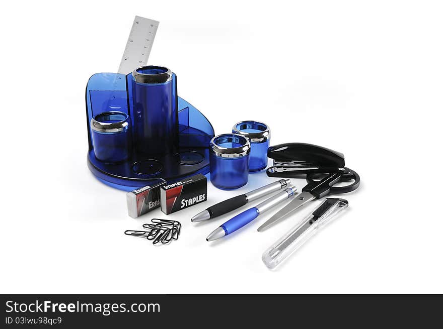 Blue plastic desk organizer with office tools