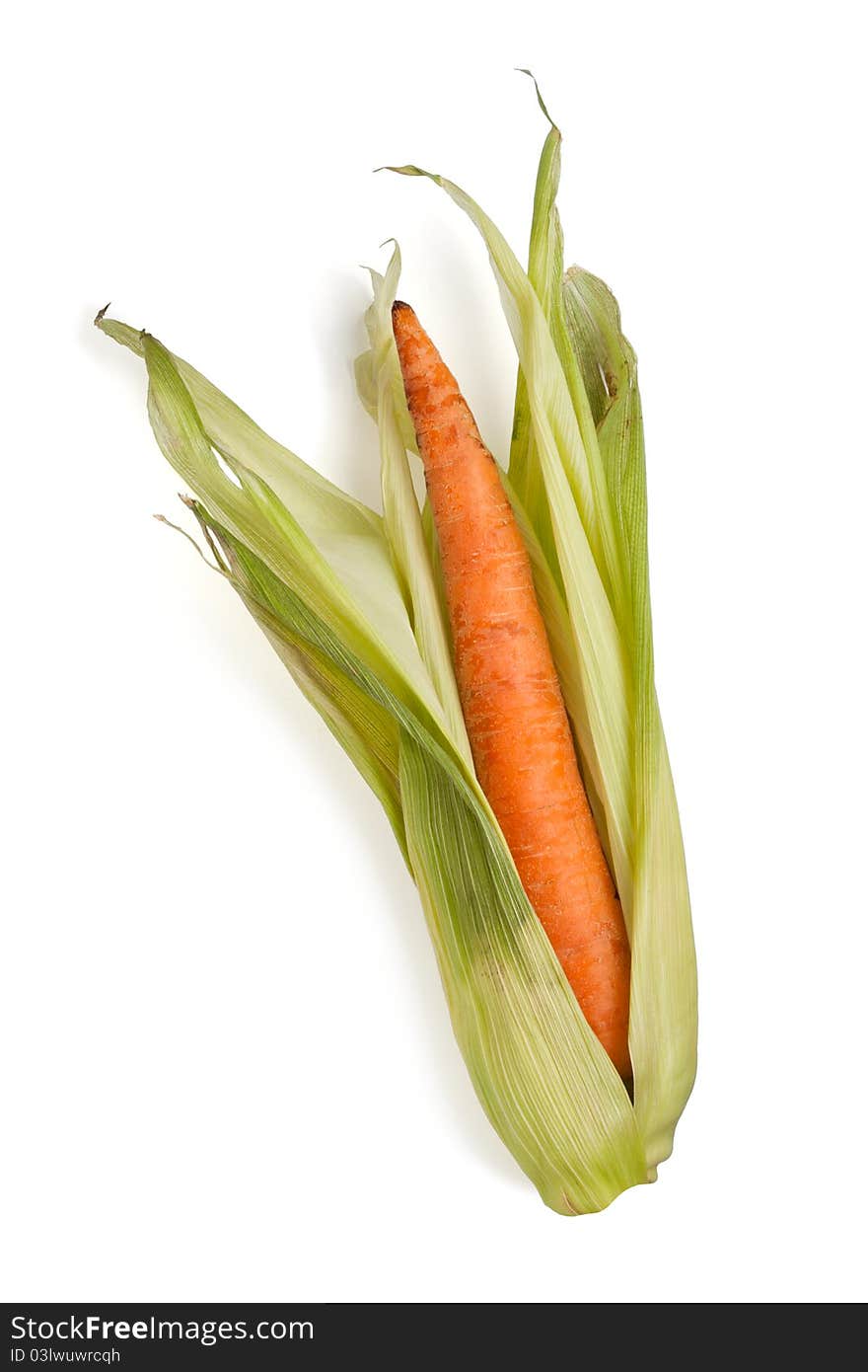 Carrot in a corn wrap isolated on white. Carrot in a corn wrap isolated on white