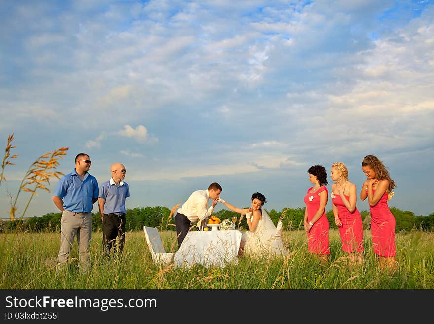 Groom kissing bride`s hand