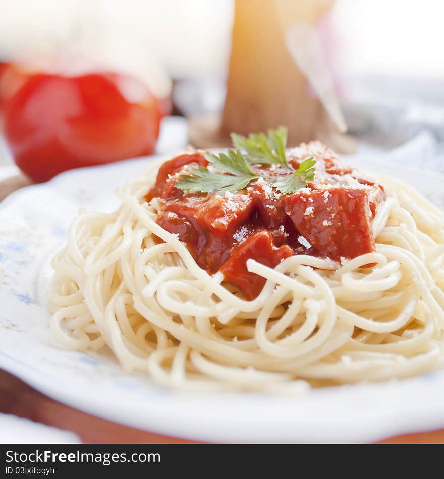 Spaghetti with tomato sauce and ingredients