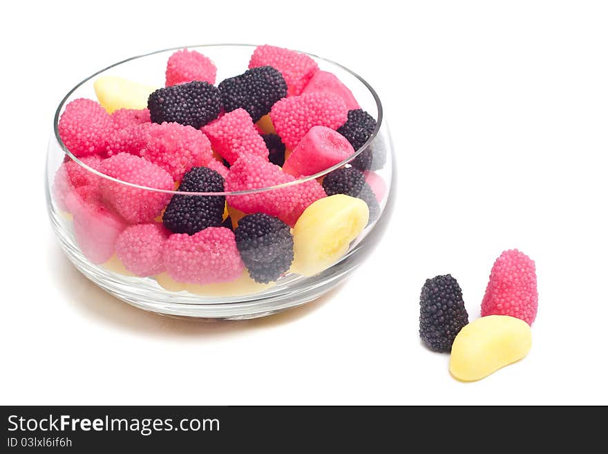 Glass Bowl Full of Colorful Jelly Beans Isolated on White