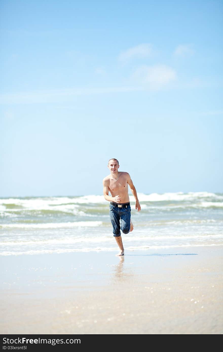 Handsome man on the sanny beach. Handsome man on the sanny beach