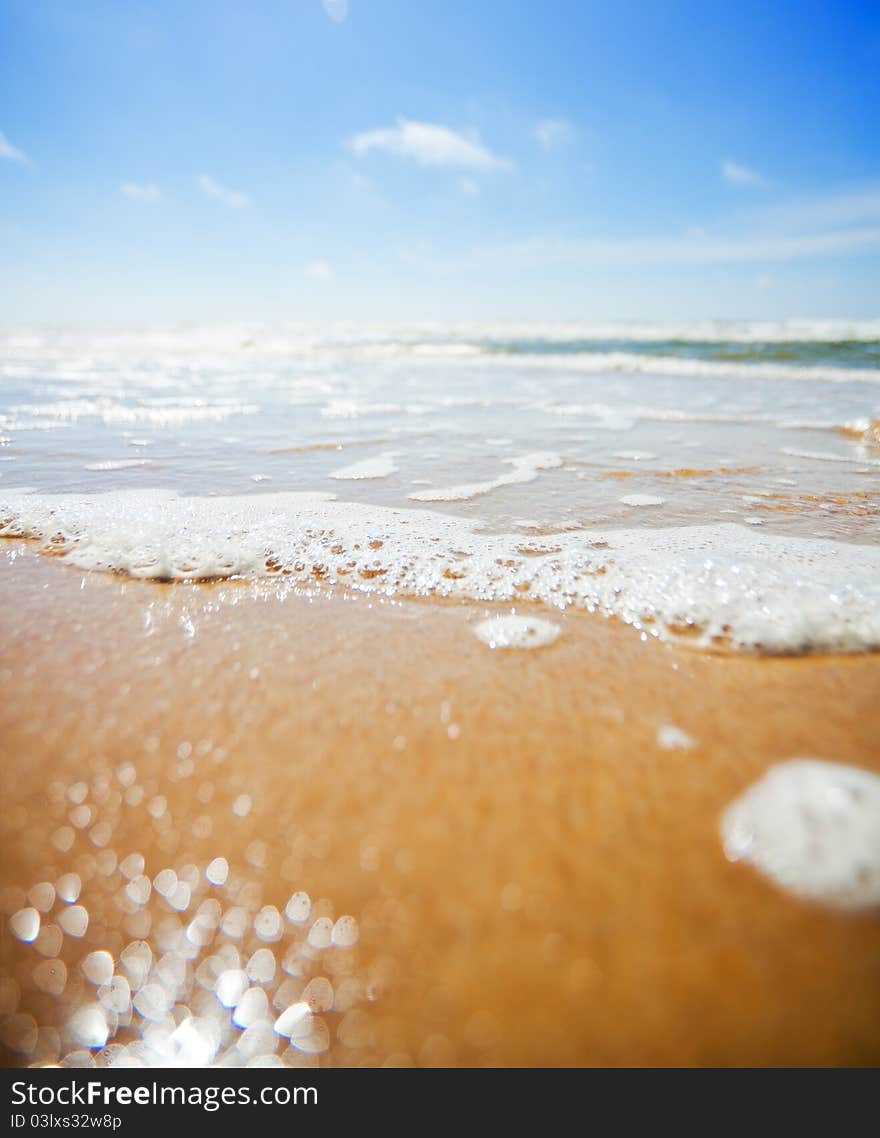 Beautiful beach and waves. Focus on water.