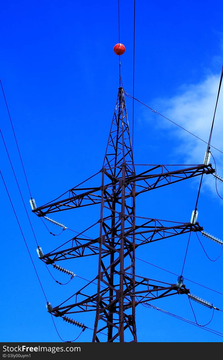 Foto of high voltage tower at summer day