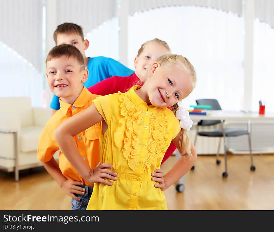 Group classmates standing in a row