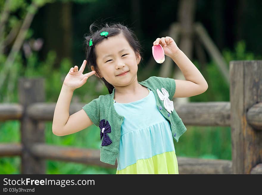 Chinese girl with lotus leaf hat,wuxi ,china