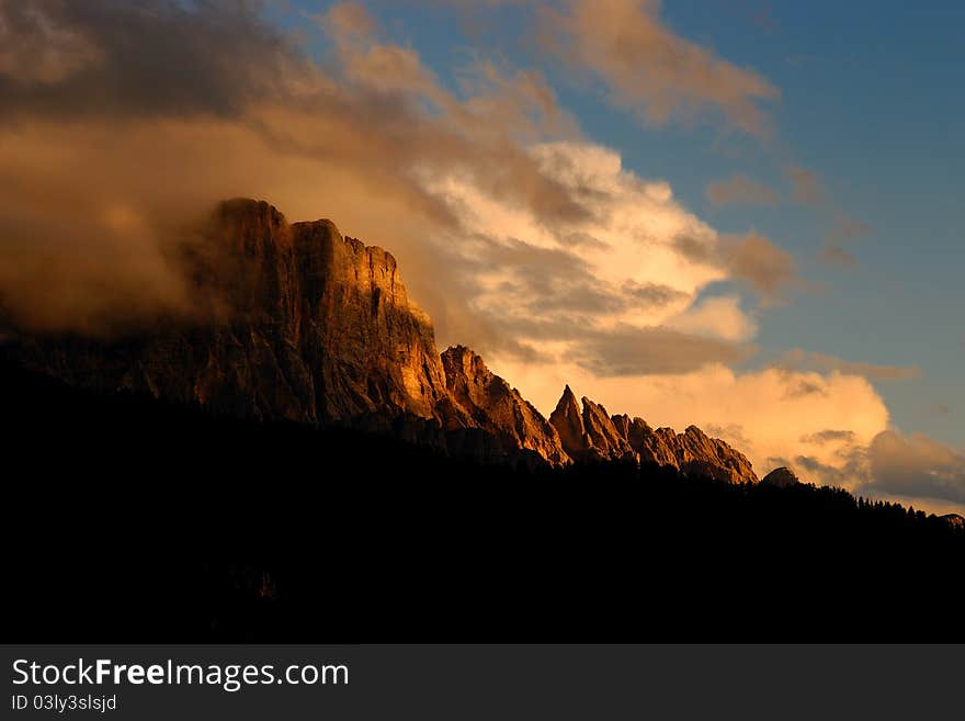 The Civetta Mountain at the sunset