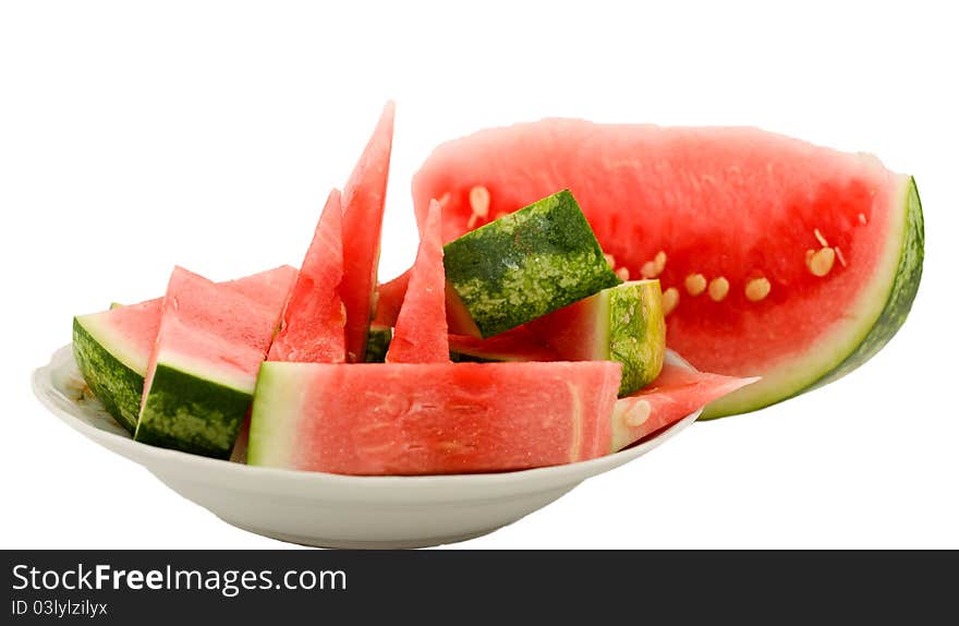 Sliced watermelon - top shot isolate in white backround. Sliced watermelon - top shot isolate in white backround