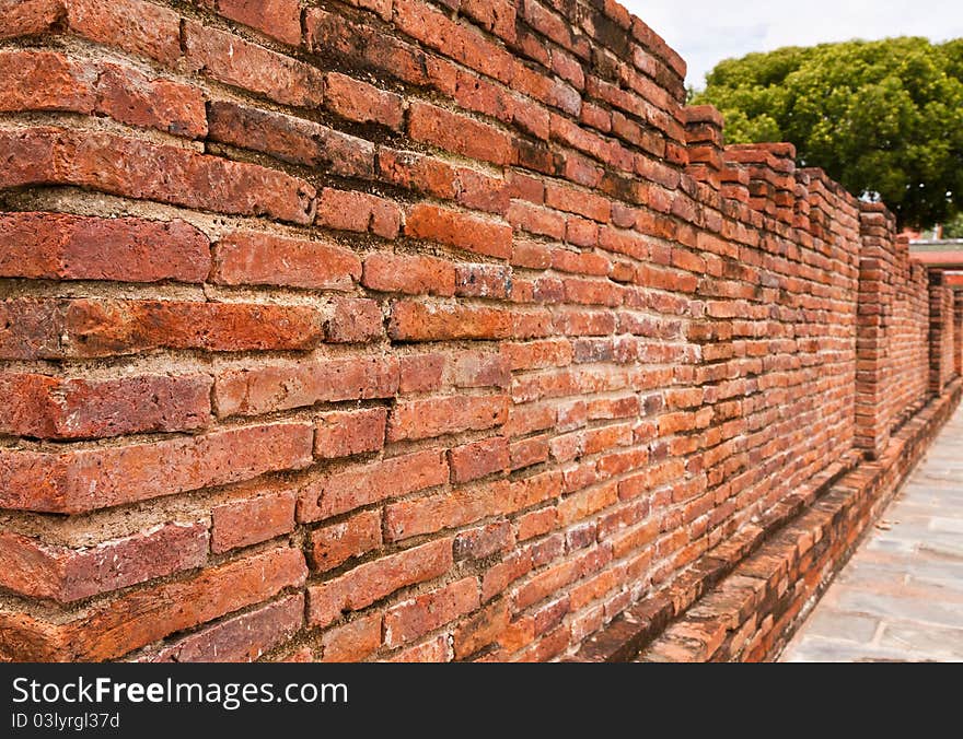 Ruin laterite brick wall texture tilted out. Ruin laterite brick wall texture tilted out