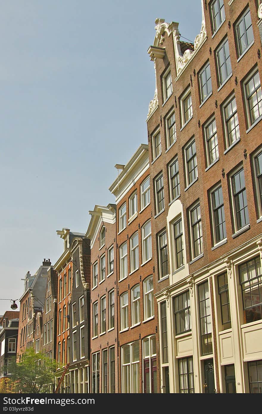 A view of historical Amsterdam buildings in spring. A view of historical Amsterdam buildings in spring