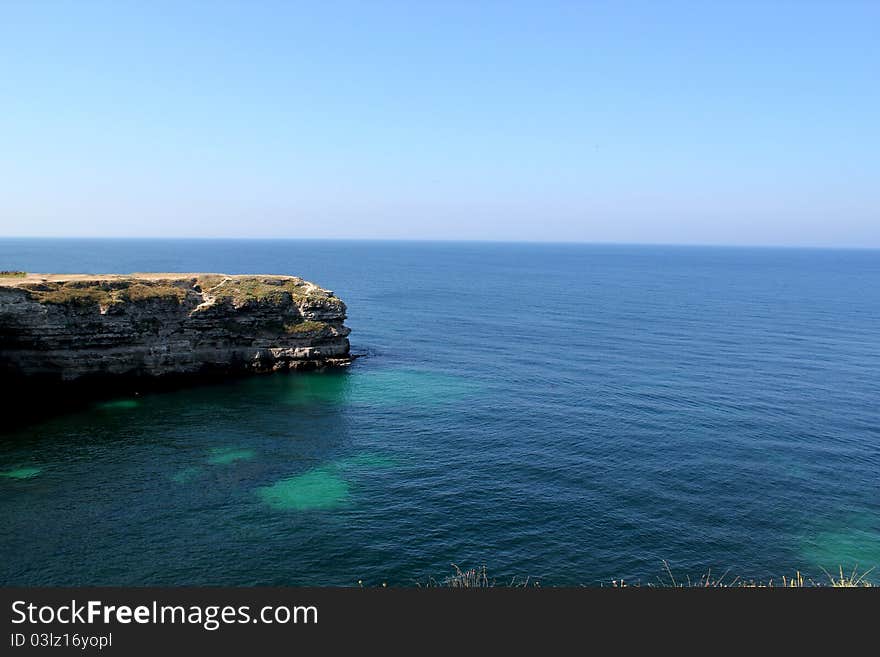 Ther Grey Rock In The Blue Sea