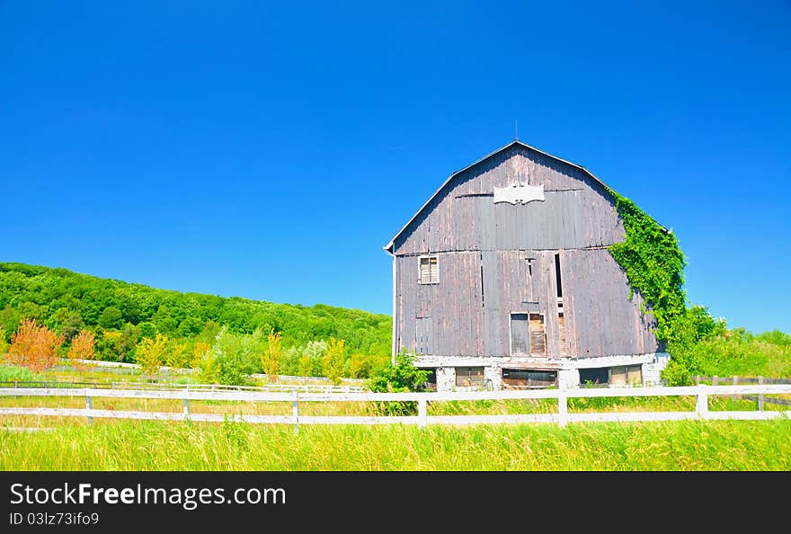 Old dilapidated barn in the suburbs. Old dilapidated barn in the suburbs