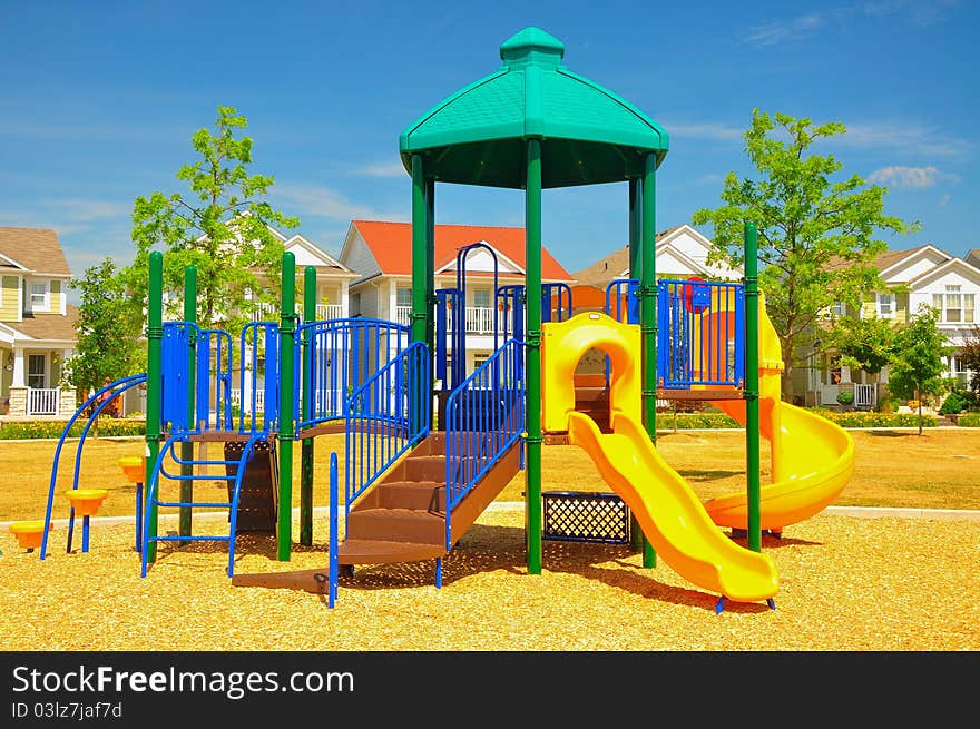 Colorful playground equipment in the neighborhood.