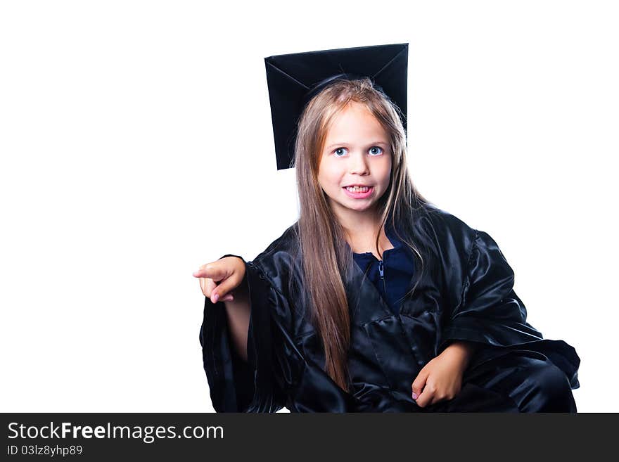 Portrait of cute gesticulating girl in black academic cap with liripipe and gown on isolated white. Portrait of cute gesticulating girl in black academic cap with liripipe and gown on isolated white