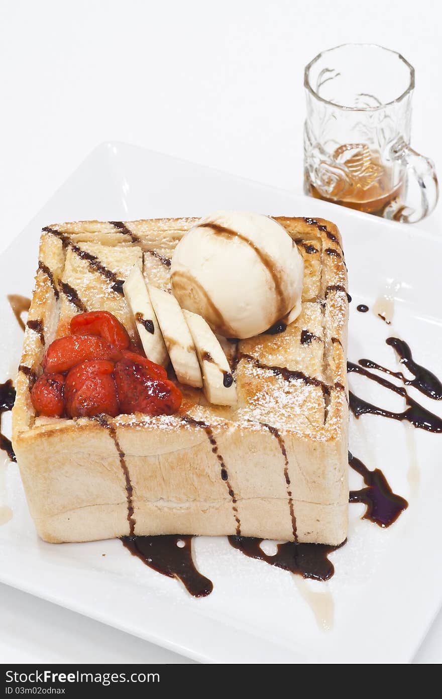 Honey toast with fruits and ice cream