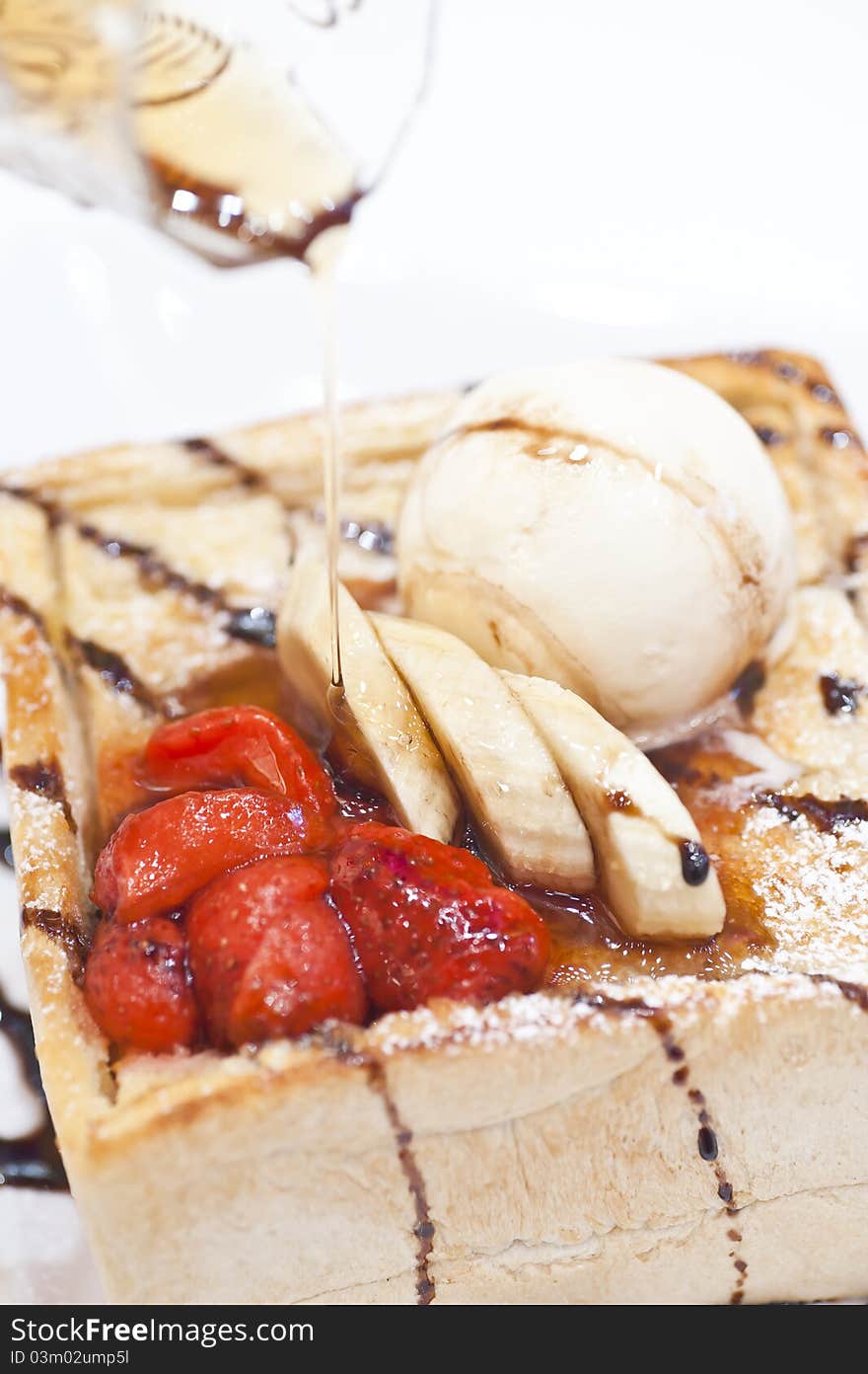 Honey toast with fruits and ice cream