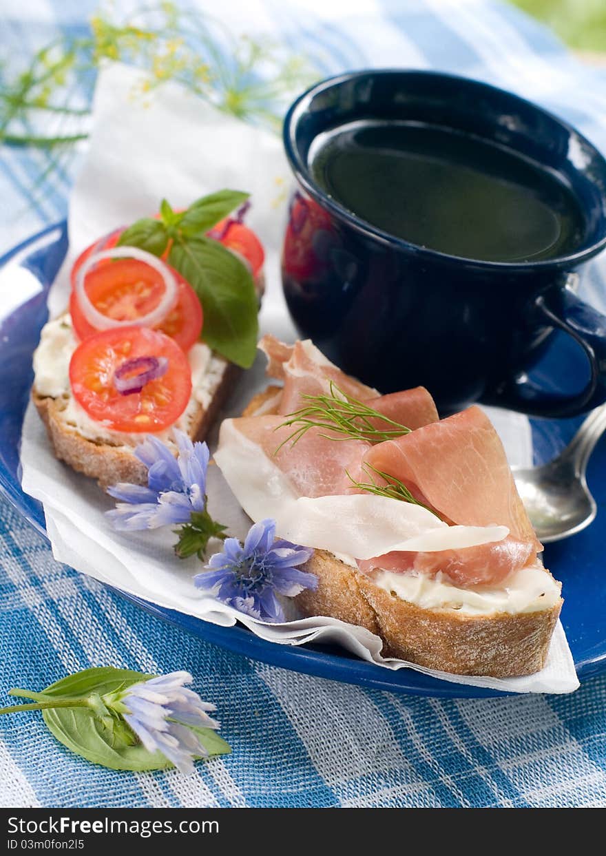 Healthy sandwich made with  bread, tomato  and ham slices. Selective focus. Healthy sandwich made with  bread, tomato  and ham slices. Selective focus