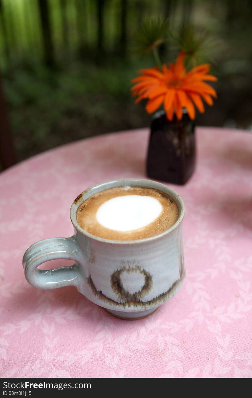 Coffee with flower in bamboo background