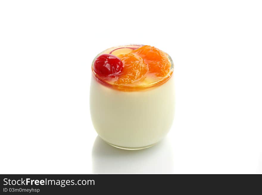 Fruit dessert with cherry and orange isolated in white background