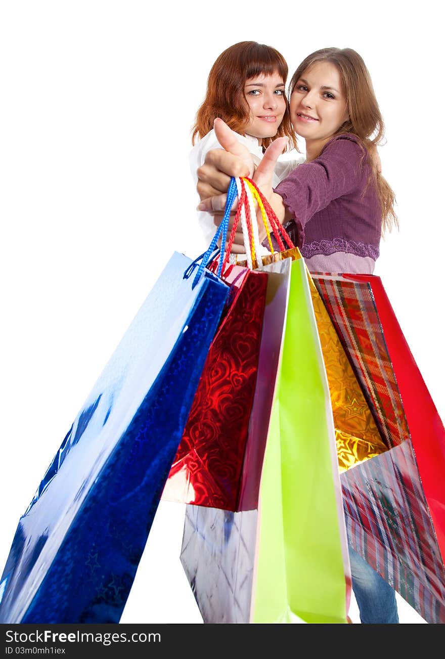 Two teen girls with bags. Isolated on white background