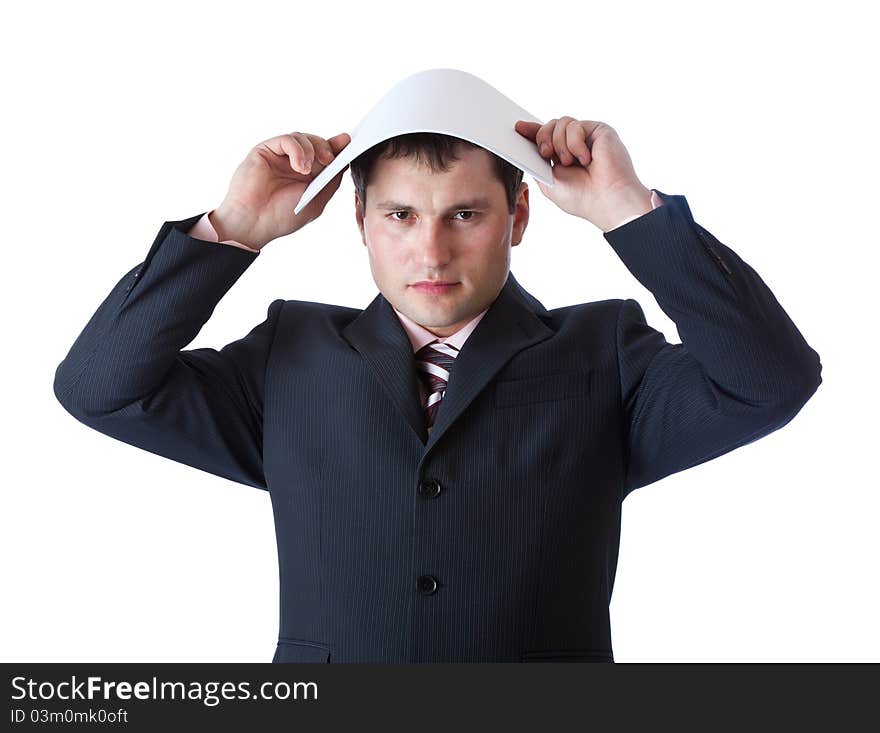 A businessman is holding a blank sheet of paper above his head. Isolated on a white background. A businessman is holding a blank sheet of paper above his head. Isolated on a white background