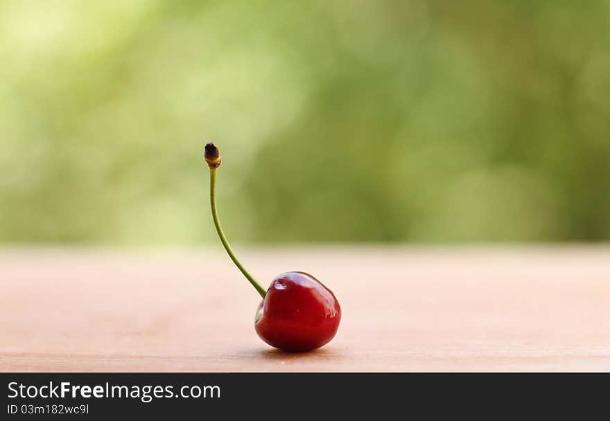 Ripe cherry on the kitchen board