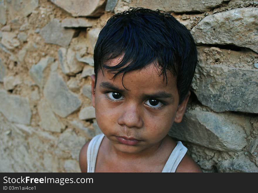 Indian rural boy posing at camera