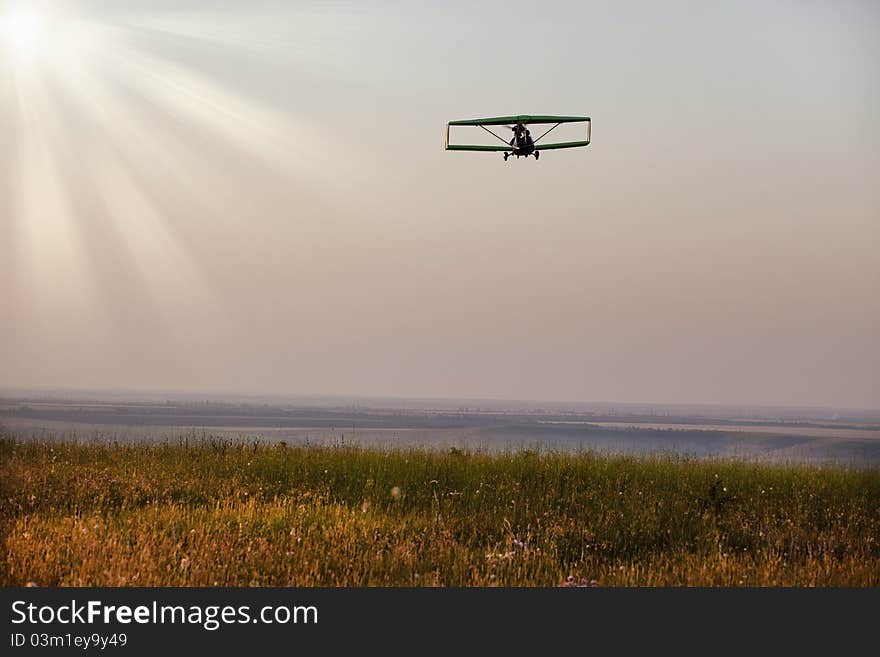 Airplane is flying to the sky for meeting sunset. Airplane is flying to the sky for meeting sunset