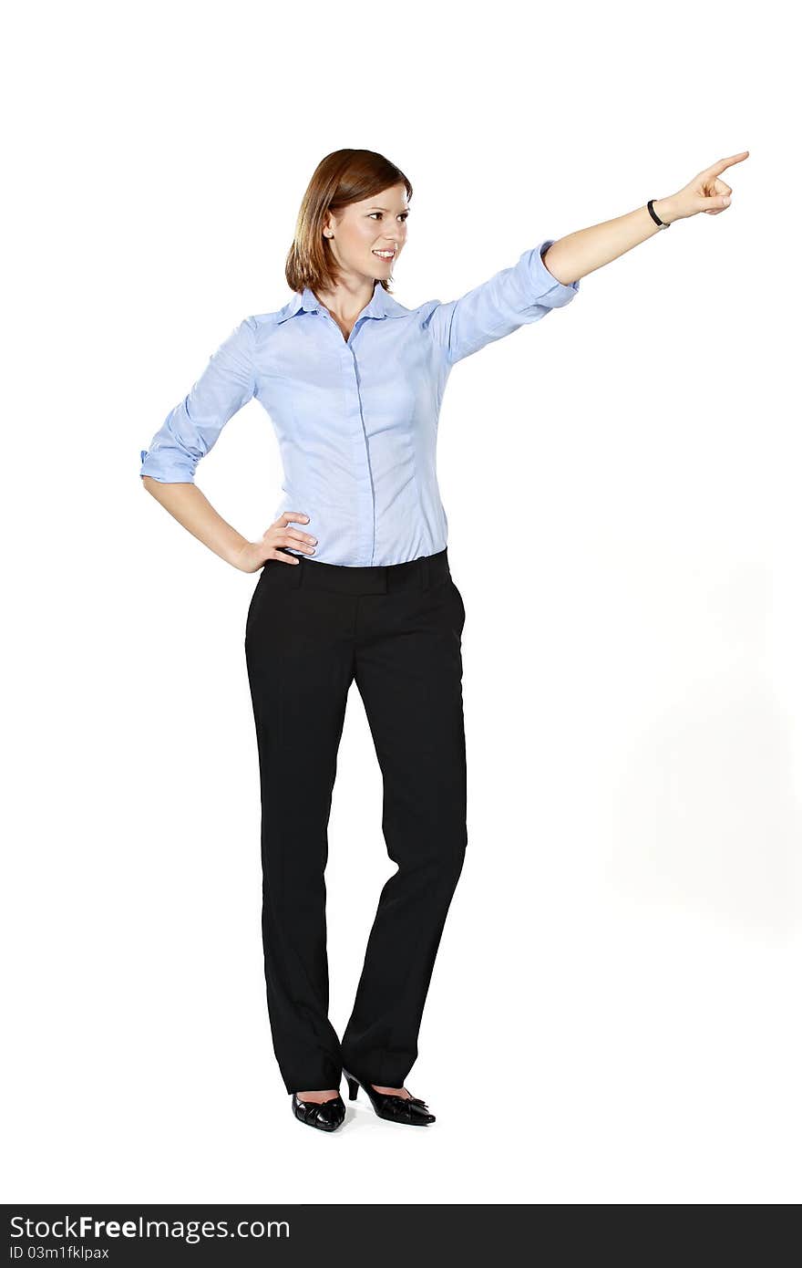 Young businesswoman isolated on a white background smiling and pointing into the distance. Young businesswoman isolated on a white background smiling and pointing into the distance.