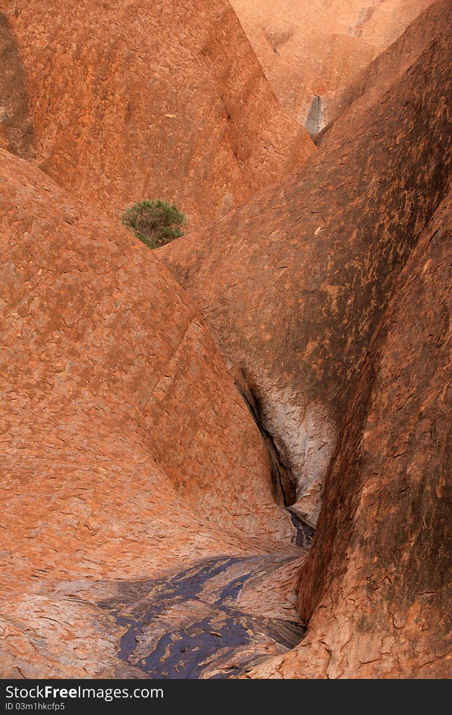 Red stone wall and desert